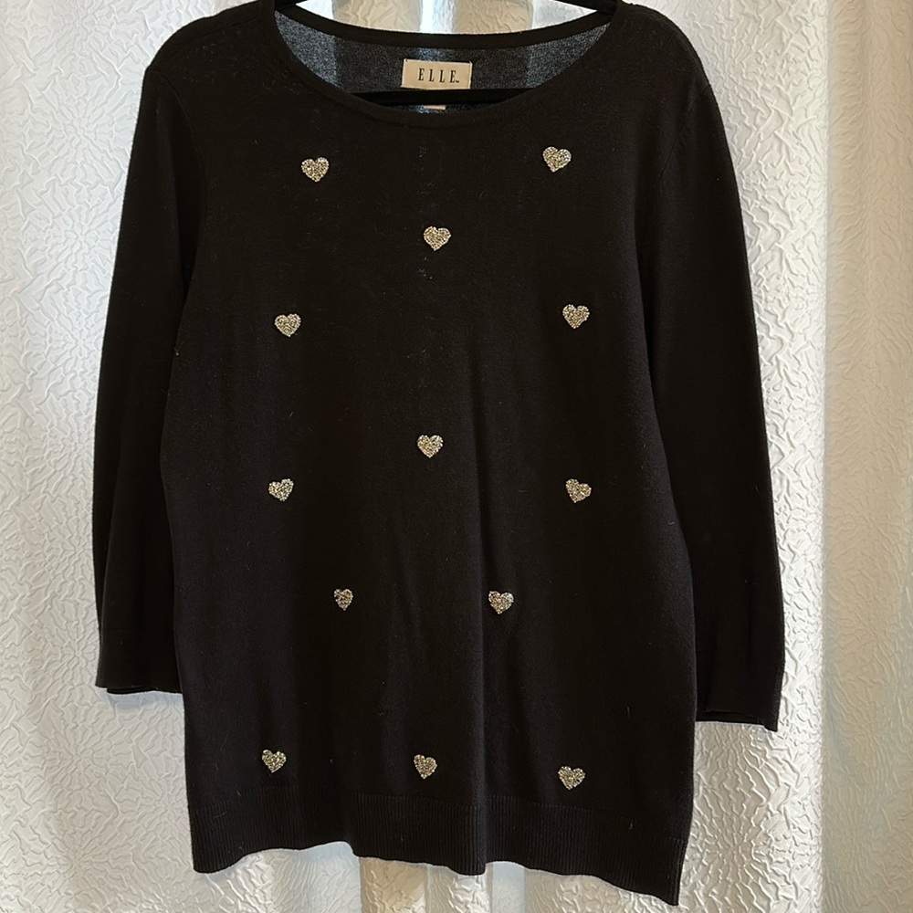 Black sweater with silver heart designs
